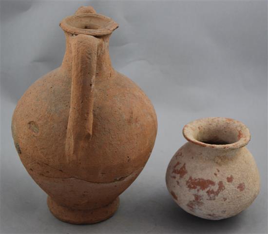 A Roman terracotta amphora and a Roman redware globular vase, c.2nd century AD, 24cm and 11cm